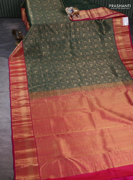 Pure kanchipuram silk saree bottle green and pink with allover zari woven brocade weaves and rich zari woven korvai border
