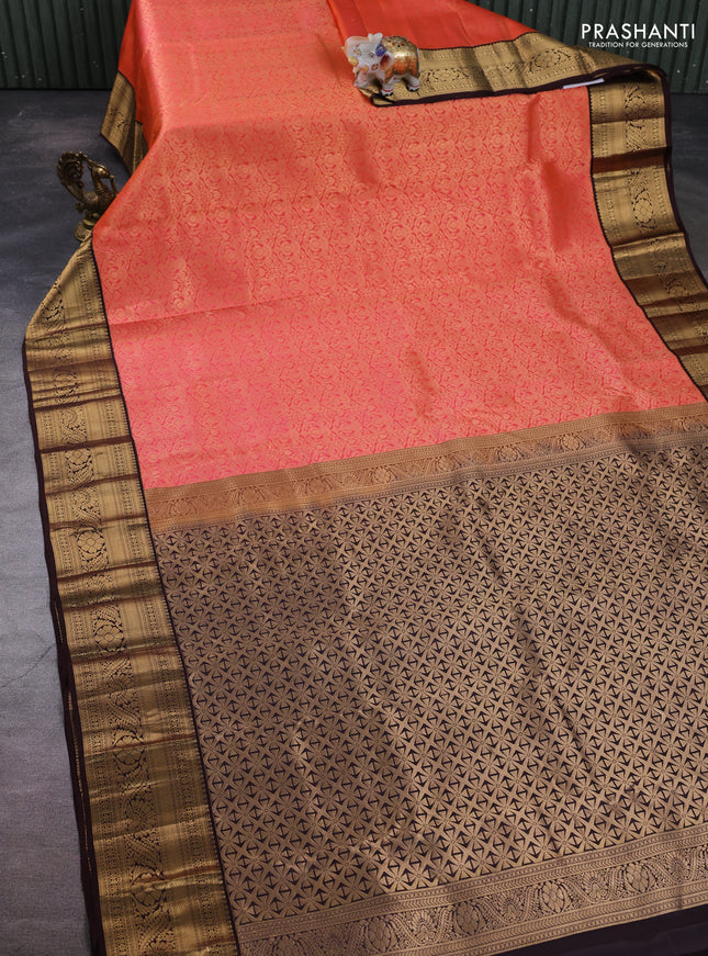 Pure kanchipuram silk saree orange and coffee brown with allover zari woven brocade weaves and zari woven border