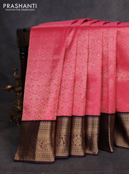 Pure kanchipuram silk saree pink shade and deep wine with allover zari woven brocade weaves and zari woven korvai border