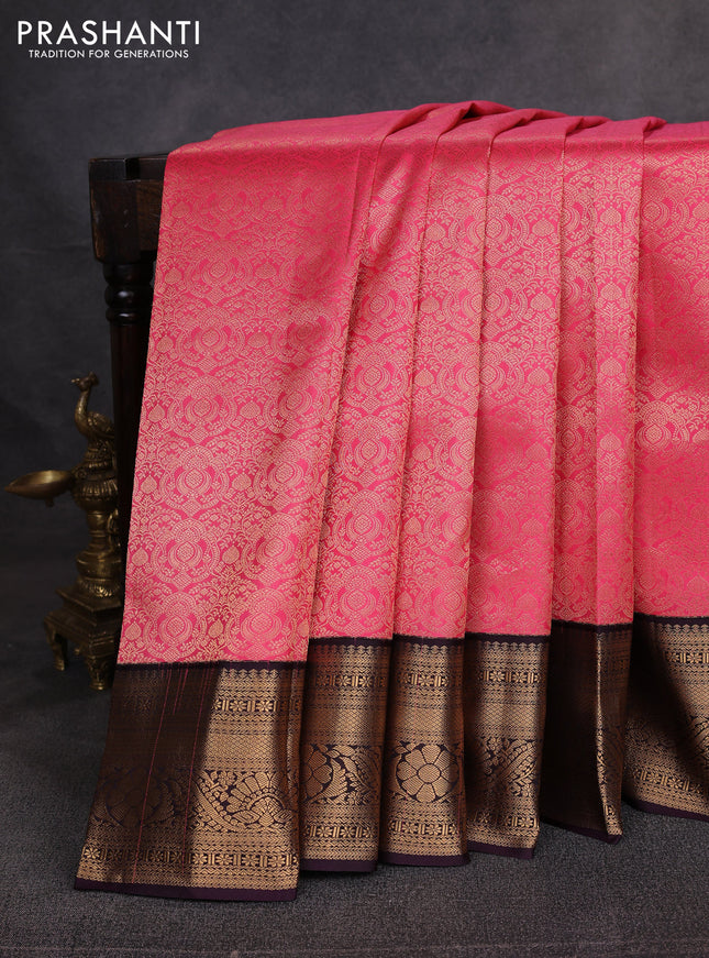 Pure kanchipuram silk saree pink shade and deep wine with allover zari woven brocade weaves and zari woven korvai border