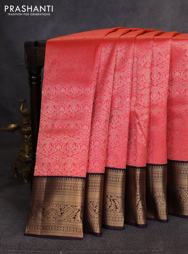 Pure kanchipuram silk saree orange and deep wine with allover zari woven brocade weaves and zari woven korvai border