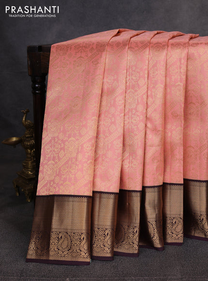 Pure kanchipuram silk saree peach pink and deep wine with allover zari woven brocade weaves and zari woven korvai border