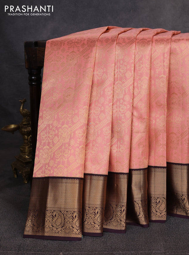 Pure kanchipuram silk saree peach pink and deep wine with allover zari woven brocade weaves and zari woven korvai border