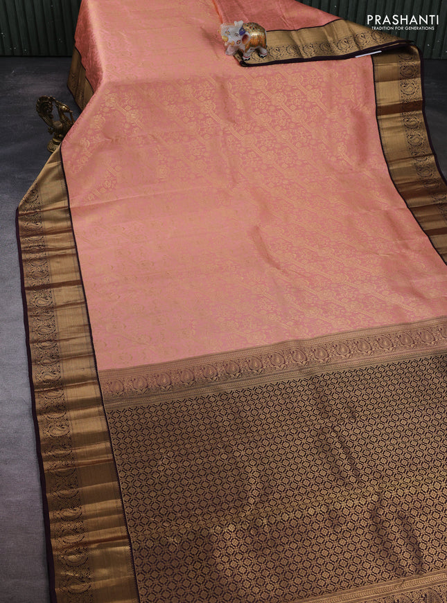 Pure kanchipuram silk saree peach pink and deep wine with allover zari woven brocade weaves and zari woven korvai border