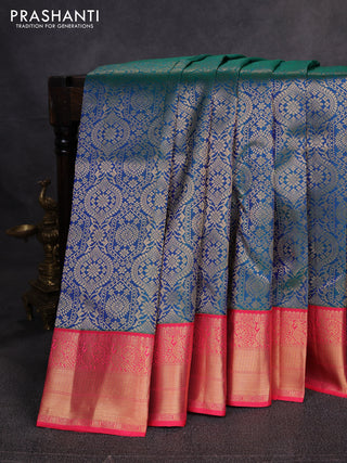 Pure kanchipuram silk saree peacock blue and tomato pink with allover zari woven brocade weaves and zari woven border