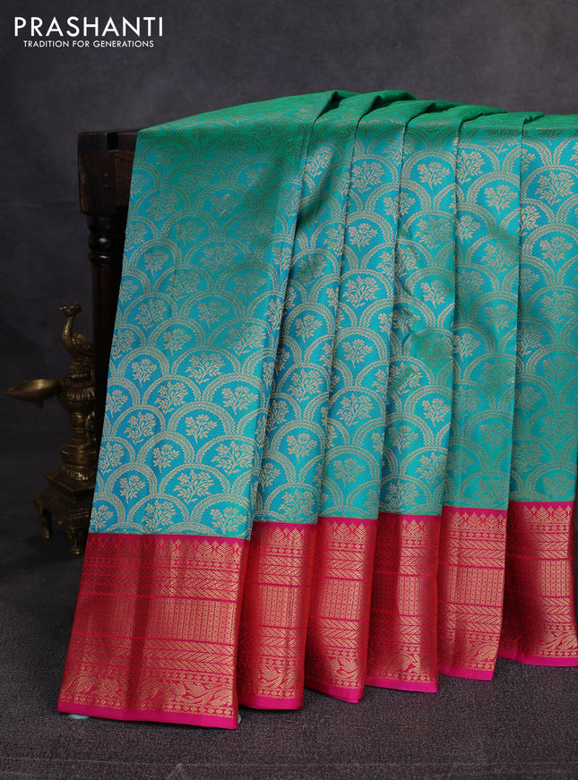 Pure kanchipuram silk saree teal green and pink with allover zari woven brocade weaves and zari woven border