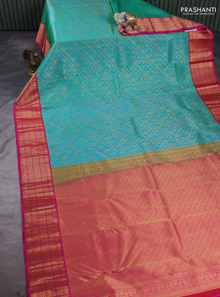 Pure kanchipuram silk saree teal green and pink with allover zari woven brocade weaves and zari woven border
