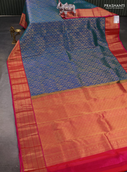 Pure kanchipuram silk saree peacock green and pink with allover zari woven brocade weaves and zari woven border