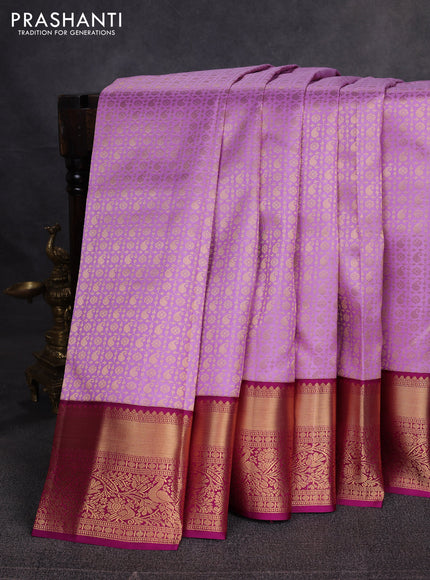 Pure kanchipuram silk saree lavender and magenta pink with allover zari woven brocade weaves and rich zari woven border