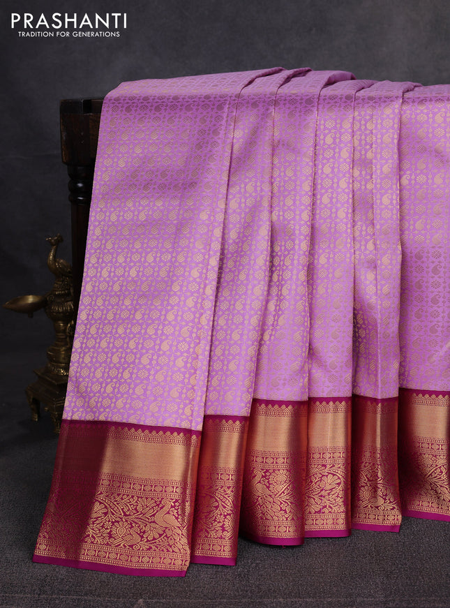 Pure kanchipuram silk saree lavender and magenta pink with allover zari woven brocade weaves and rich zari woven border