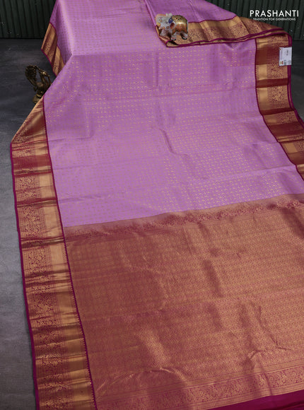 Pure kanchipuram silk saree lavender and magenta pink with allover zari woven brocade weaves and rich zari woven border