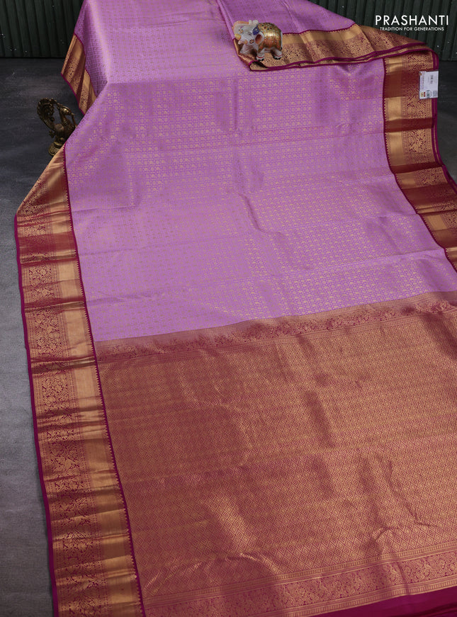 Pure kanchipuram silk saree lavender and magenta pink with allover zari woven brocade weaves and rich zari woven border