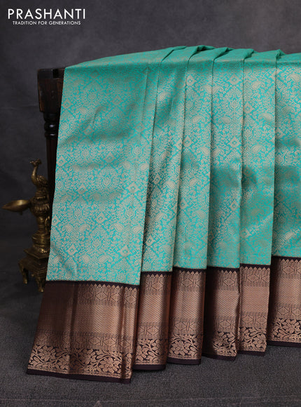 Pure kanchipuram silk saree teal green and coffee brown with allover zari woven brocade weaves and zari woven korvai border