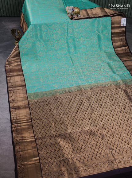 Pure kanchipuram silk saree teal green and coffee brown with allover zari woven brocade weaves and zari woven korvai border