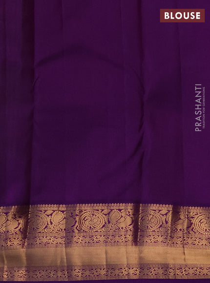 Pure kanchipuram silk saree light green and purple with allover zari woven brocade weaves and rich zari woven korvai border