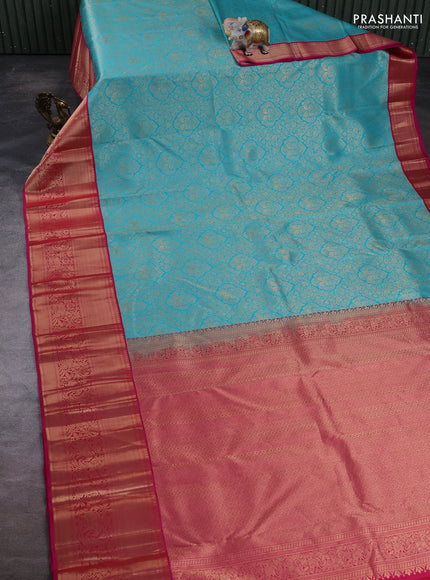 Pure kanchipuram silk saree teal blue and pink with allover zari woven brocade weaves and long zari woven border