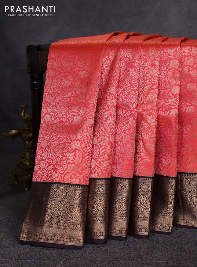 Pure kanchipuram silk saree orange and jamun with allover zari woven brocade weaves and zari woven border