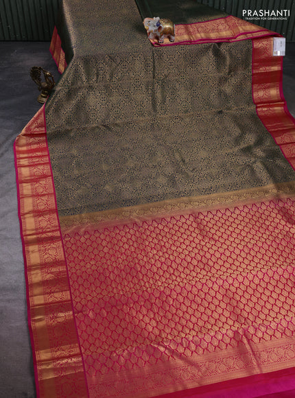 Pure kanchipuram silk saree bottle green and pink with allover zari woven brocade weaves and rich zari woven boder