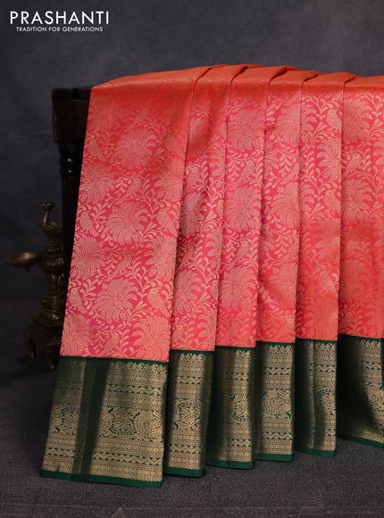 Pure kanchipuram silk saree dual shade of pinkish orange and green with allover zari woven brocade weaves and zari woven border