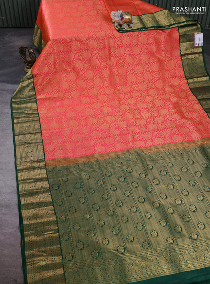 Pure kanchipuram silk saree dual shade of pinkish orange and green with allover zari woven brocade weaves and zari woven border