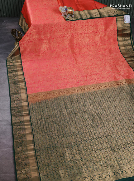 Pure kanchipuram silk saree orange and bottle green with allover zari woven brocade weaves and rich zari woven boder
