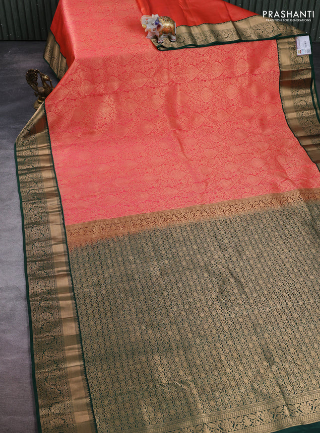 Pure kanchipuram silk saree orange and bottle green with allover zari woven brocade weaves and rich zari woven boder