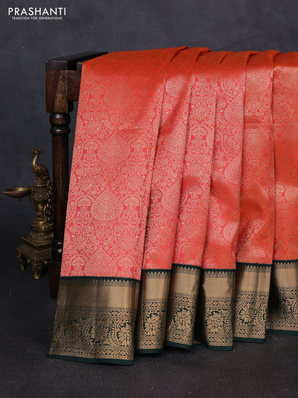 Pure kanchipuram silk saree orange and bottle green with allover zari woven brocade weaves and rich zari woven korvai border