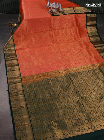 Pure kanchipuram silk saree orange and bottle green with allover zari woven brocade weaves and rich zari woven korvai border