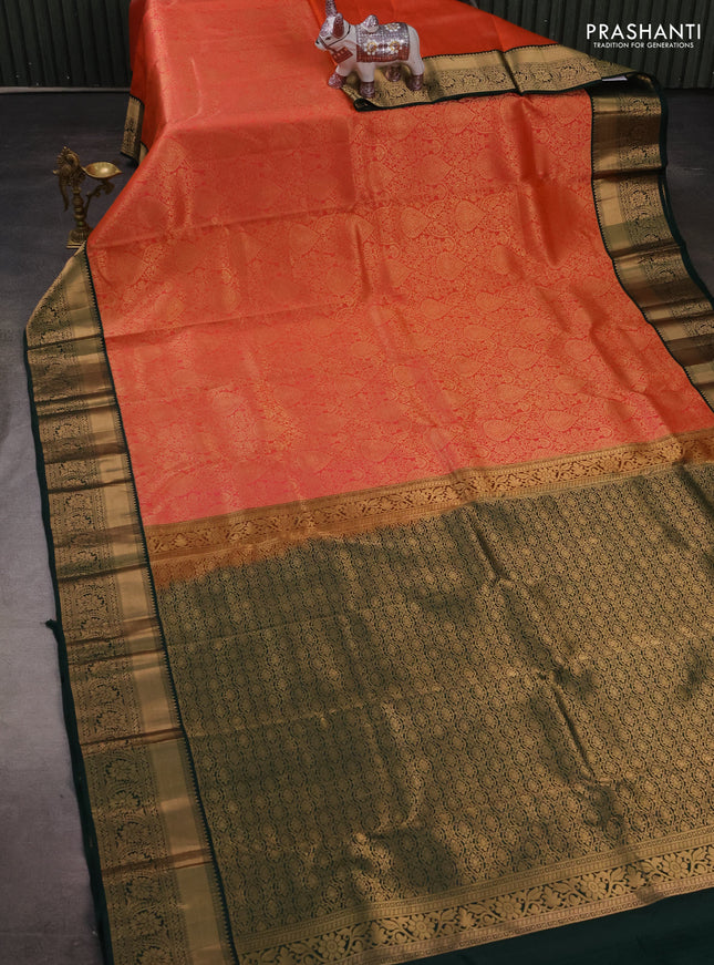 Pure kanchipuram silk saree orange and bottle green with allover zari woven brocade weaves and rich zari woven korvai border
