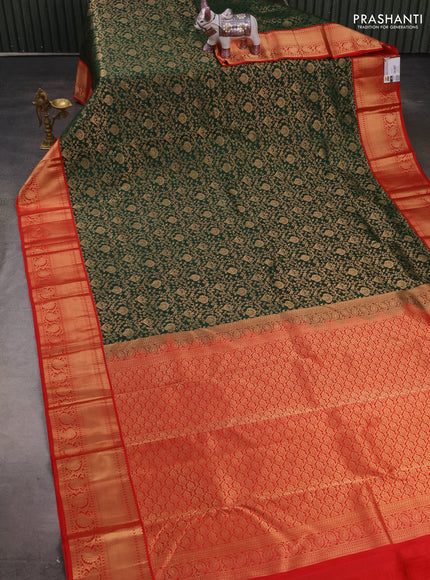 Pure kanchipuram silk saree bottle green and red with allover zari woven brocade weaves and zari woven korvai border