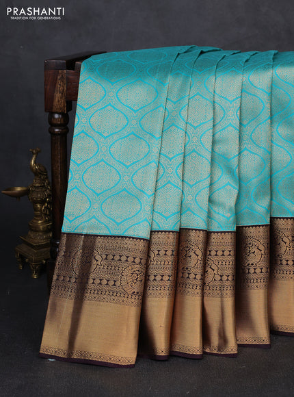 Pure kanchipuram silk saree deep wine and teal blue with allover zari woven brocade weaves and long rich zari woven korvai border