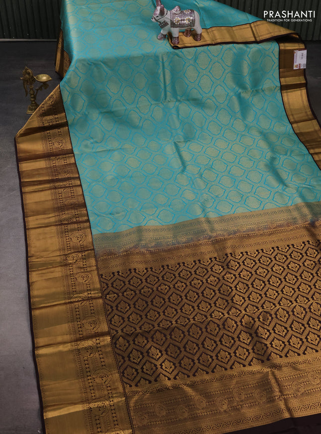 Pure kanchipuram silk saree deep wine and teal blue with allover zari woven brocade weaves and long rich zari woven korvai border