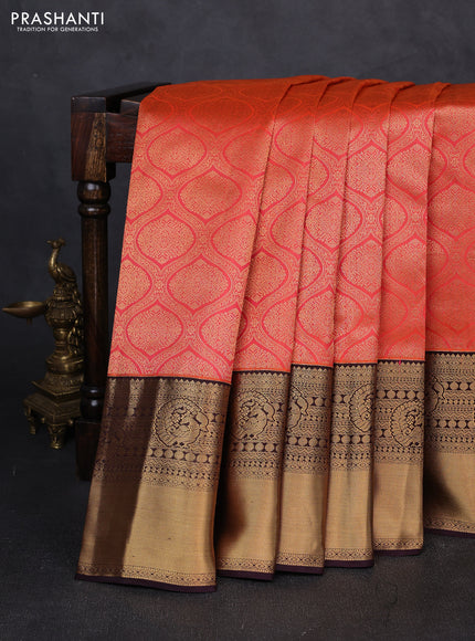 Pure kanchipuram silk saree orange and coffee brown with allover zari woven brocade weaves and long rich zari woven korvai border