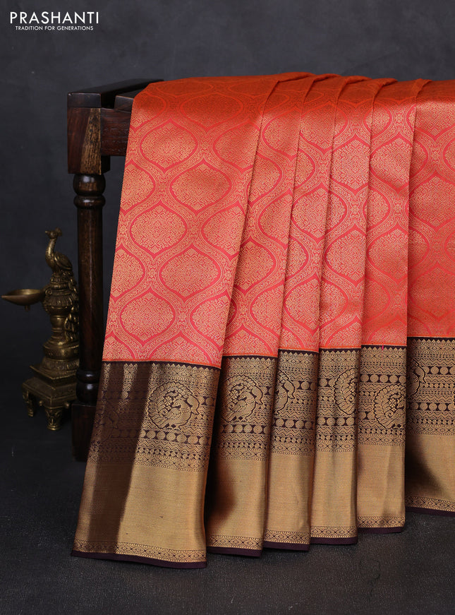 Pure kanchipuram silk saree orange and coffee brown with allover zari woven brocade weaves and long rich zari woven korvai border
