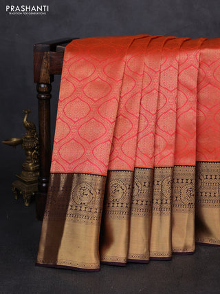 Pure kanchipuram silk saree orange and coffee brown with allover zari woven brocade weaves and long rich zari woven korvai border
