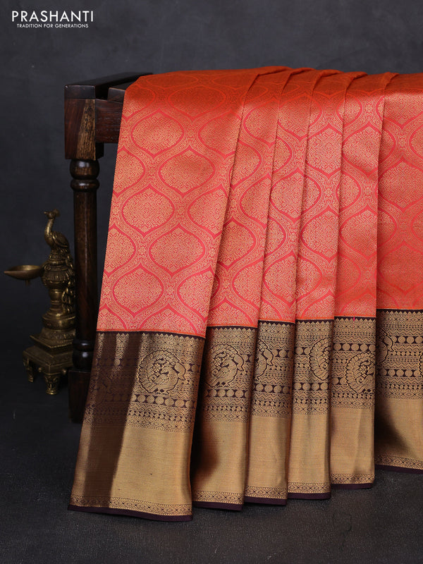 Pure kanchipuram silk saree orange and coffee brown with allover zari woven brocade weaves and long rich zari woven korvai border
