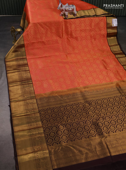 Pure kanchipuram silk saree orange and coffee brown with allover zari woven brocade weaves and long rich zari woven korvai border