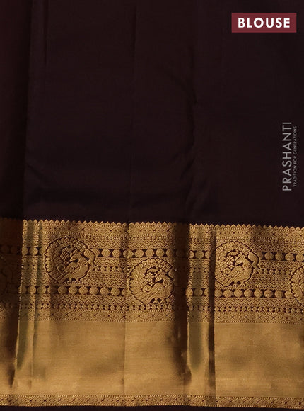 Pure kanchipuram silk saree orange and coffee brown with allover zari woven brocade weaves and long rich zari woven korvai border