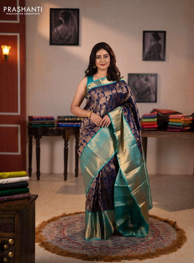 Pure kanchipuram silk saree navy blue and teal green with allover zari woven brocade weaves and long rich zari woven korvai border