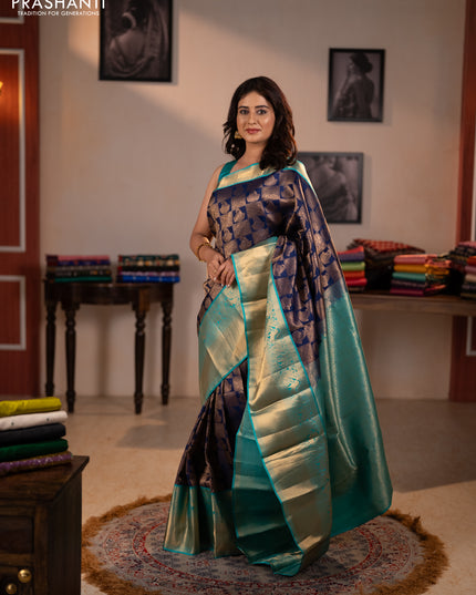Pure kanchipuram silk saree navy blue and teal green with allover zari woven brocade weaves and long rich zari woven korvai border