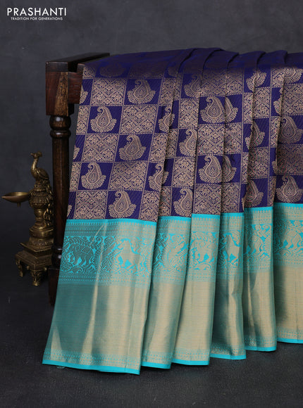 Pure kanchipuram silk saree navy blue and teal green with allover zari woven brocade weaves and long rich zari woven korvai border
