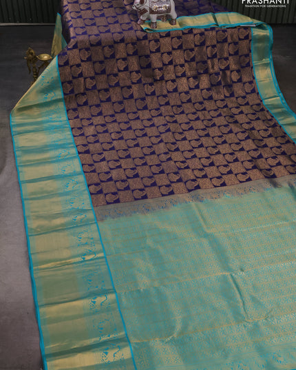 Pure kanchipuram silk saree navy blue and teal green with allover zari woven brocade weaves and long rich zari woven korvai border