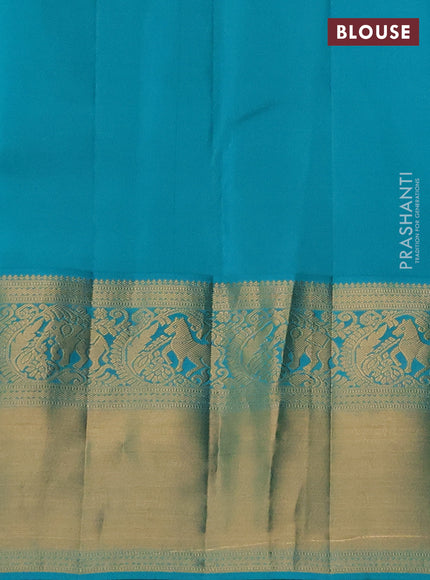 Pure kanchipuram silk saree navy blue and teal green with allover zari woven brocade weaves and long rich zari woven korvai border