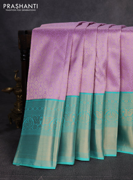 Pure kanchipuram silk saree lavender and teal green with allover zari woven brocade weaves and long zari woven border