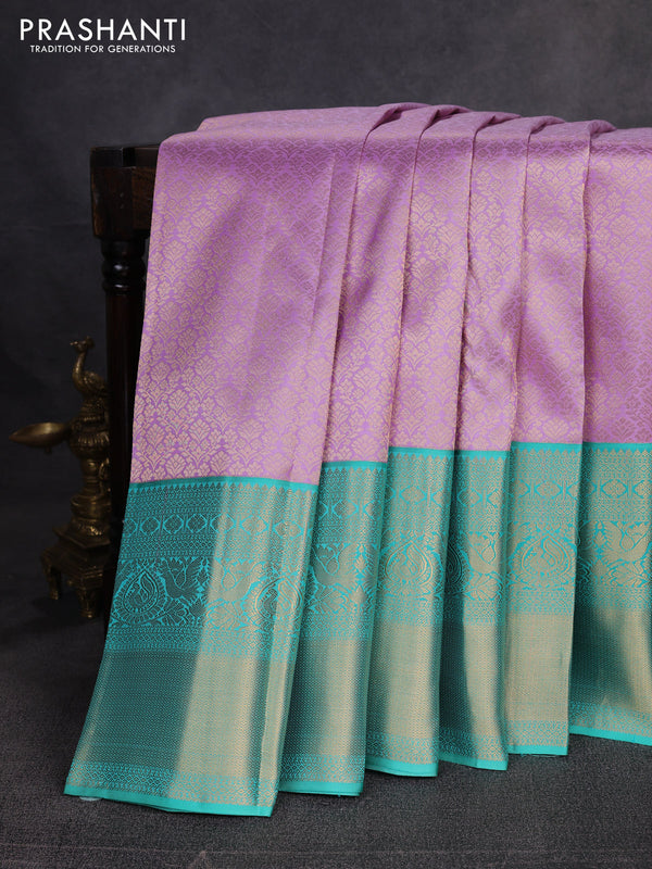 Pure kanchipuram silk saree lavender and teal green with allover zari woven brocade weaves and long zari woven border