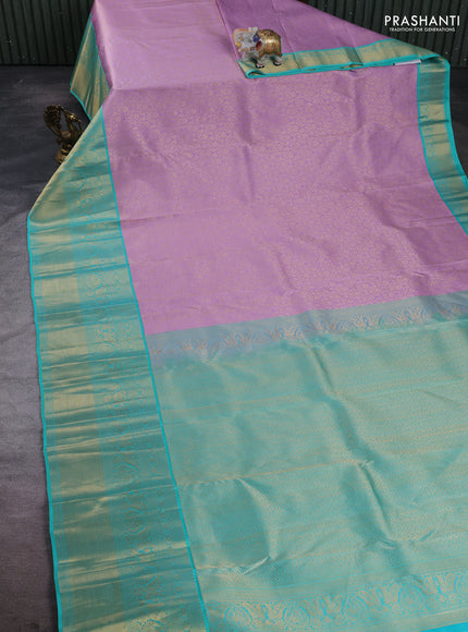 Pure kanchipuram silk saree lavender and teal green with allover zari woven brocade weaves and long zari woven border