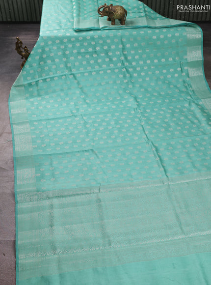 Chiniya silk saree teal blue with allover thread & zari woven buttas and woven border