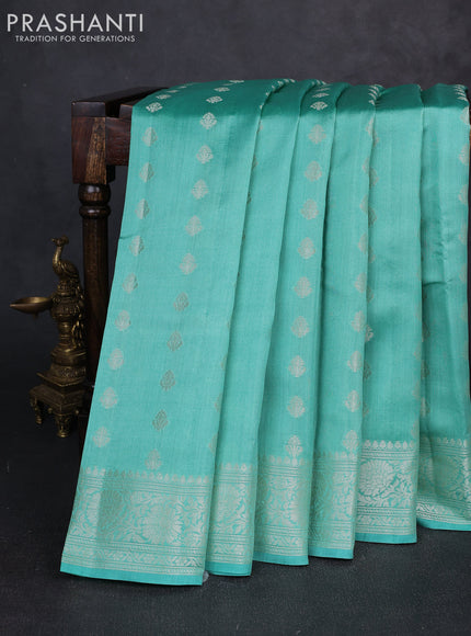 Chiniya silk saree teal green with allover thread & zari brocade weaves and zari woven border