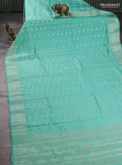 Chiniya silk saree teal green with allover thread & zari brocade weaves and zari woven border