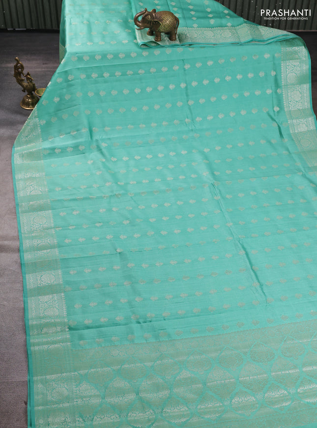 Chiniya silk saree teal green with allover thread & zari brocade weaves and zari woven border